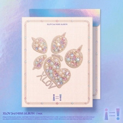 XLOV i=! 3rd Mini Album i Version cover – pastel pink and holographic package with a jeweled paw-print heart of pearls and crystal rhinestones