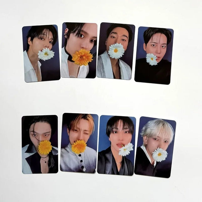 ATEEZ photocard collection featuring members holding flowers