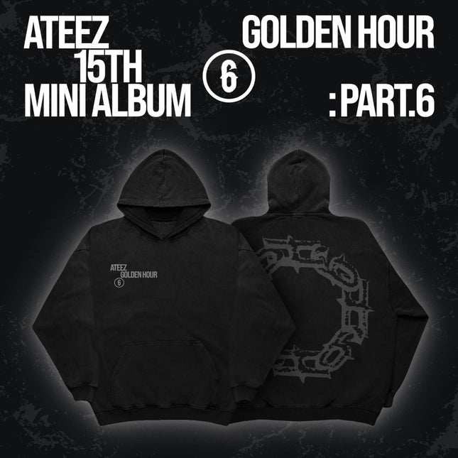 ATEEZ GOLDEN HOUR Part.6 official hoodie in washed black, front and back: grey "ATEEZ GOLDEN HOUR 6" left-chest print, kangaroo pocket, large grey gothic graffiti-style spiked circle emblem on the back