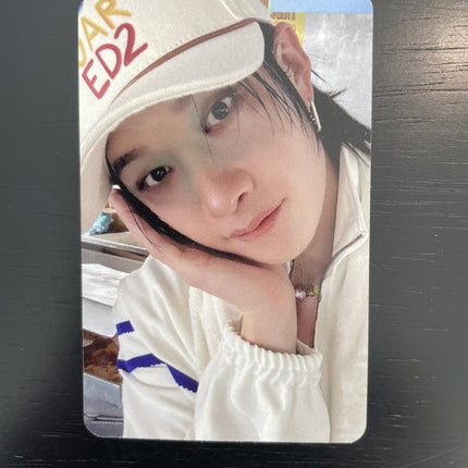 Stray Kids Bang Chan 2026 Season Greetings Straight Supper Club Apple Music POB Photocard — dark wet hair white cap ED2 text varsity stripe zip-up necklace diner background