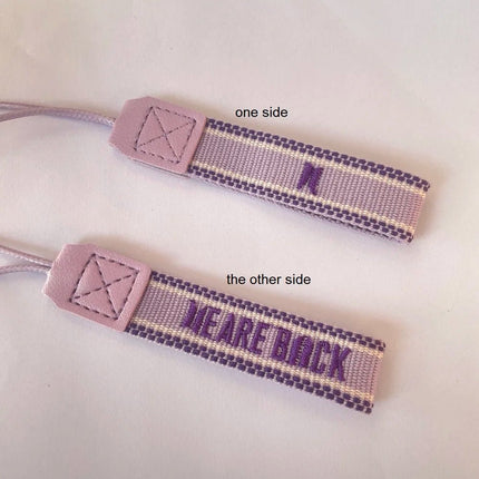 BTS WE ARE BACK Woven Letter Lanyard Strap showing double sided woven design