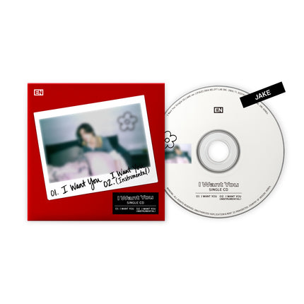 ENHYPEN 'I Want You' Single CD JAKE ver. – red hardcover sleeve with Polaroid photo of Jake lying on pastel sheets, white CD with JAKE name tag