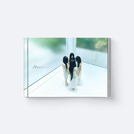ILLIT BREAK EVEN Standard Ver. SIGNED QUIET Ver. photobook cover: four members with long black hair in white dresses in a white room with frosted green glass walls, grey book band