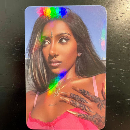 KATSEYE Lara WILD Yes24 POB holographic photocard with iridescent rainbow shimmer finish, official Yes24 pre-order benefit, 55 × 85 mm. 