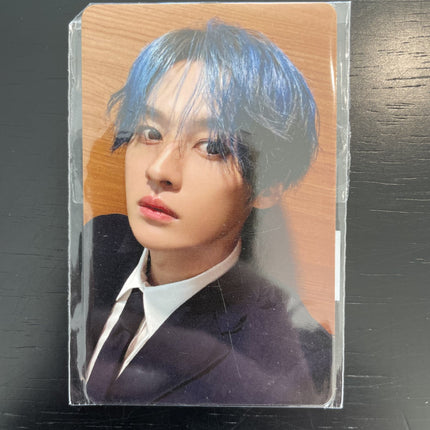 Stray Kids Lee Know KARMA Fans Shop Lucky Draw POB Photocard sealed — dark swept hair black suit white shirt black tie knowing expression warm honey background