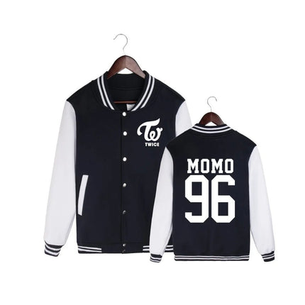 Black and white varsity jacket with 'Twice' logo on a hanger against a white background