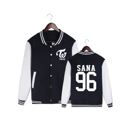 Black and white varsity jacket with 'TWICE' logo on a hanger against a white background