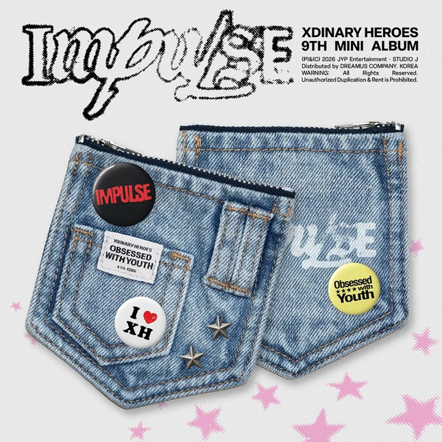 Xdinary Heroes 9th Mini Album IMPULSE Denim Pouch Version packshot – light-wash denim zip pouch shaped like a jeans back pocket, shown front and back, with pin badges reading IMPULSE, I love XH and Obsessed with Youth, a woven "Obsessed with Youth" label and silver star studs, on a pale background with pink stars